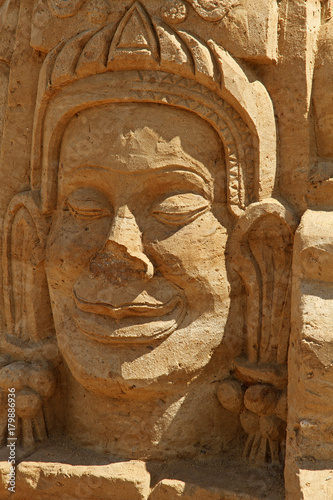 Sand sculpture man face