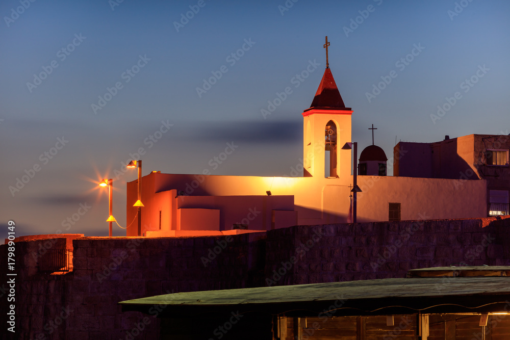 Beautiful, evening view of the Church of St. John the Baptist in the city of Acre. Israel. Beautiful, evening view of the Church of St. John the Baptist in the city of Acre. Israel.