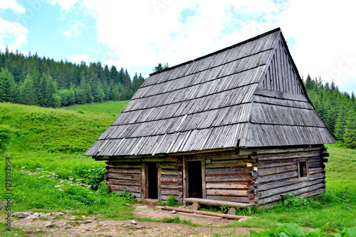 Old wooden hut in the meadow, Tatra mountains, Poland
