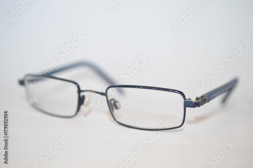 close up of a pair of children's used eye glasses 