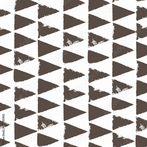 Seamless pattern with triangles. Forms printed in ink. Hand drawn. Vector illustration.