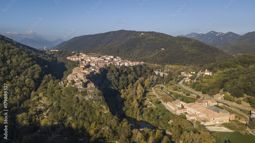 Aerial view of Castellfollit de la Roca cliff village in Catalonia