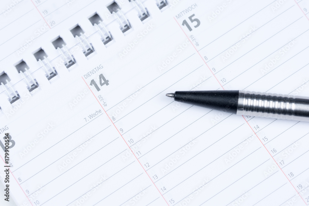 Terminkalender mit Stift - Blanko mit Textfreiraum Terminkalender mit Stift - Blanko mit Textfreiraum