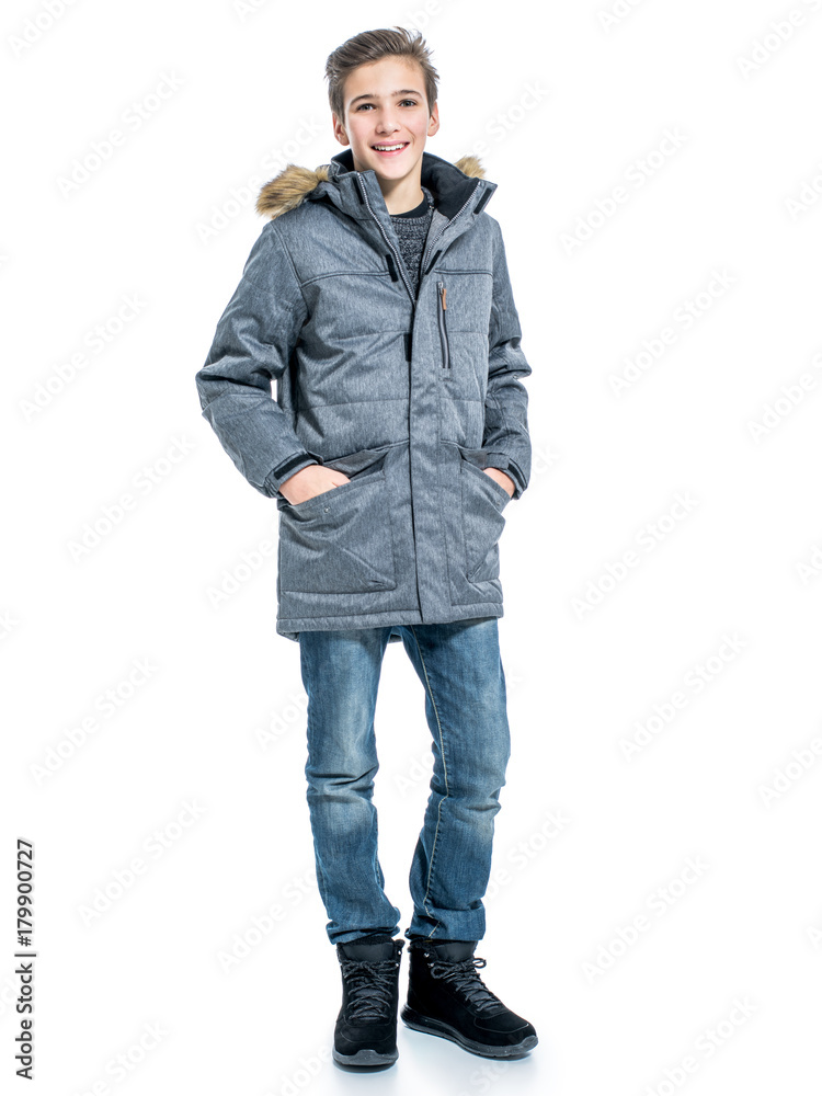 Fototapeta premium Teenage boy in winter clothes