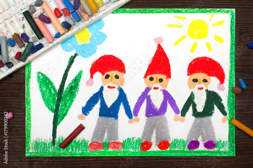 Obraz na plátně Colorful drawing: three smiling dwarfs in red hats