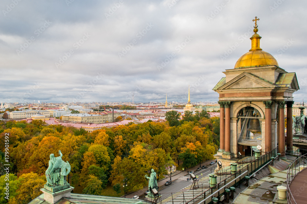 A bell tower of St. Isaak's Cathedral and a view of Saint-Petersburg from the top