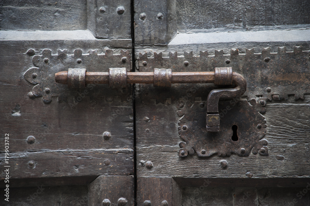 Gubbio, Perugia, Italy -  ancient door latch, architectural details of the ancient palaces