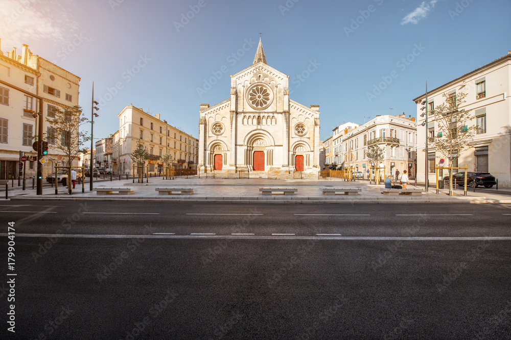 Street view on the saint Paul church during the sunny morning in Nimes in the Occitanie region of southern France