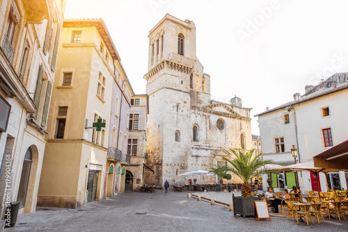 View on the saint Castor cathedral in the center of the old town of Nimes city in the Occitanie region of southern France © rh2010