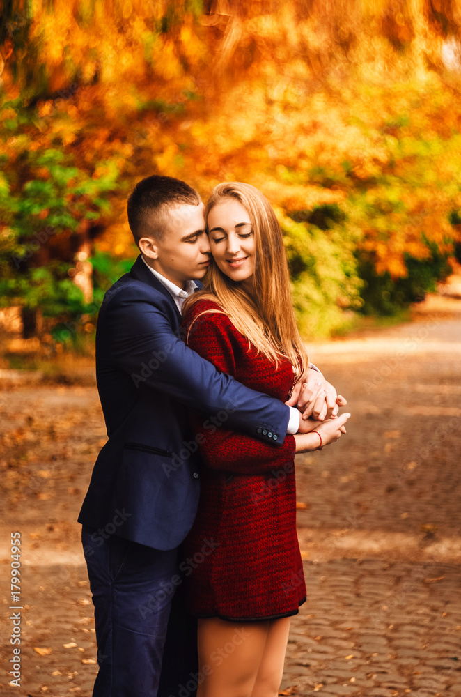 Warm golden autumn. the relationship between a girl and a guy. sincere feelings Warm golden autumn. the relationship between a girl and a guy. sincere feelings
