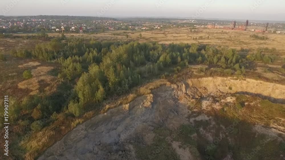 Aerial view of huge landslide near mining of potassium ore, deep hole in soil, Stebnyk, Truskavets, Ukraine Aerial view of huge landslide near mining of potassium ore, deep hole in soil, Stebnyk, Truskavets, Ukraine