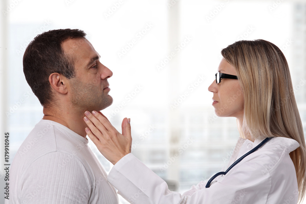 Man getting thyroid gland control. Health care and medical concept. Man getting thyroid gland control. Health care and medical concept.