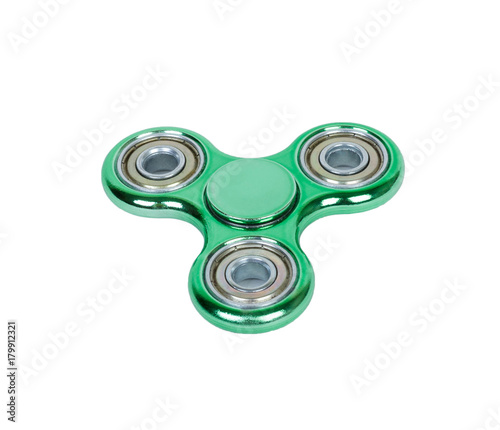 fidget spinner green isolated on white background photo