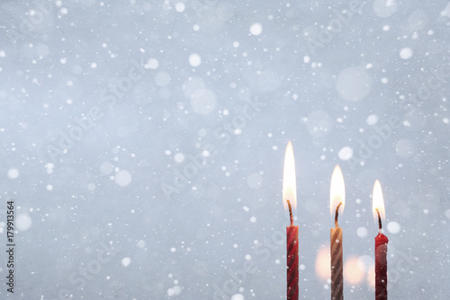 Artwork in retro style, burning candles, snow
