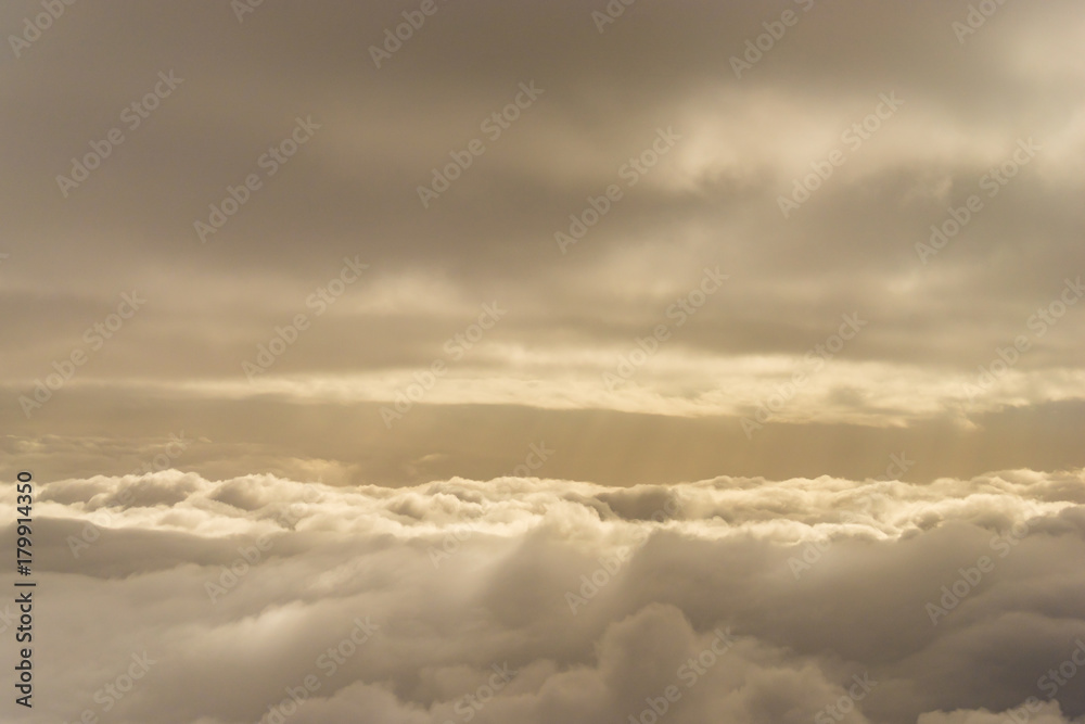 Obraz premium sunny sky above the clouds