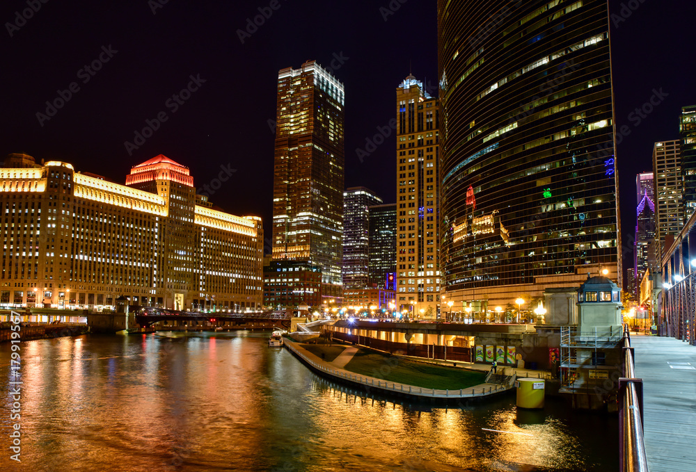 Fototapeta premium Big City along river at night skyline