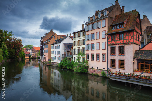 Fototapeta Naklejka Na Ścianę i Meble -  Beautiful view of the historic town of Strasbourg, colorful houses on idyllic river. Strasbourg, France