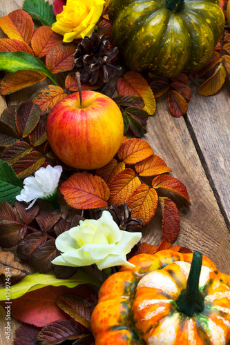 Thanksgiving decoration with apple  green and orange pumpkins