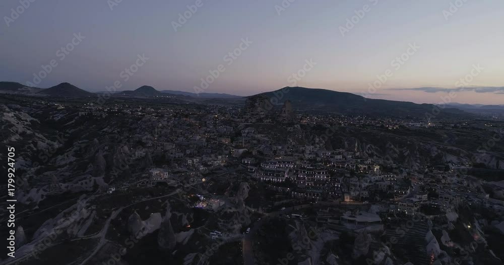 Aerial view of love valley in Goreme village, Turkey. countryside lifestyle. Top view of beautiful rural volcanic mountain landscape in Cappadocia. Travel,tourism and destination concept. Aerial view of love valley in Goreme village, Turkey. countryside lifestyle. Top view of beautiful rural volcanic mountain landscape in Cappadocia. Travel,tourism and destination concept.