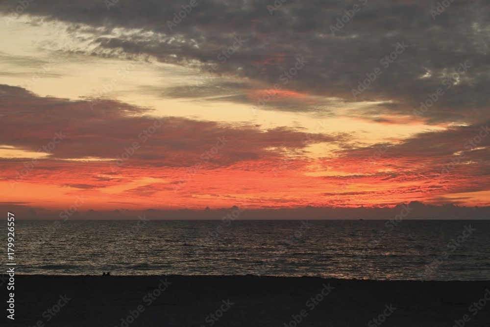 Sunset sky with open space over horizon in Turtle Beach, Florida
