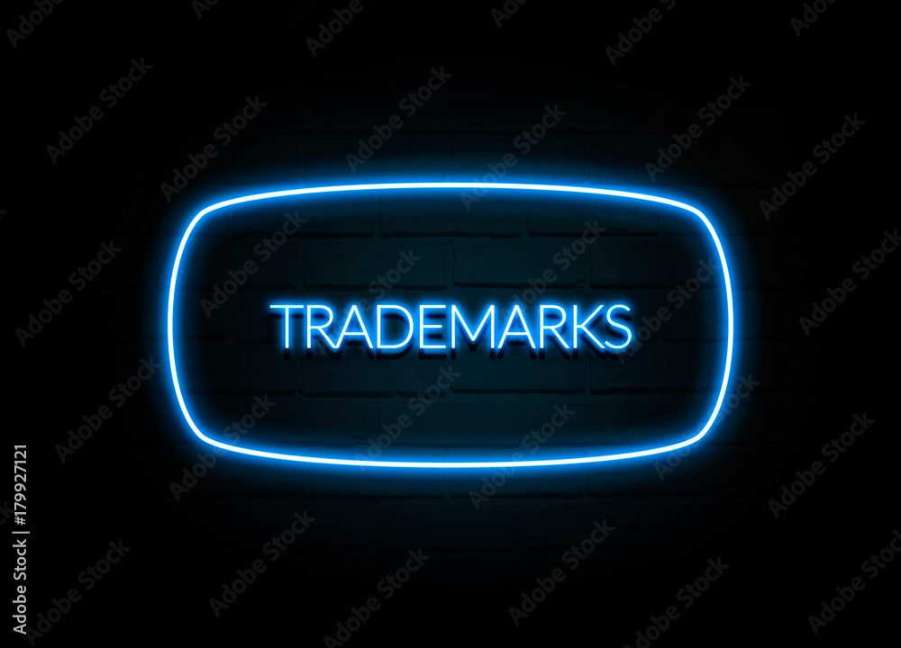 Trademarks  - colorful Neon Sign on brickwall