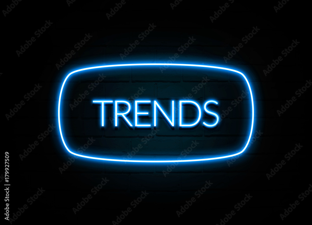 Trends  - colorful Neon Sign on brickwall