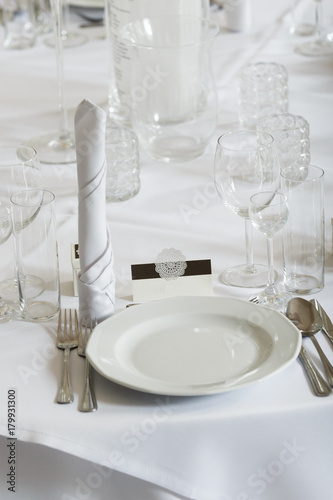 Detailed closeup of tableware, cuttlery and wedding decorations