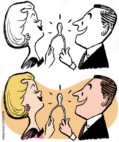 A couple pulling a wishbone and making a wish