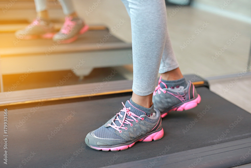 Close up Foot of fitness girl running on track. Close up Foot of fitness girl running on track.