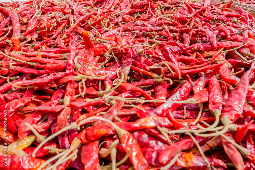 Fototapeta premium Closeup many dried red chili pepper texture for background .