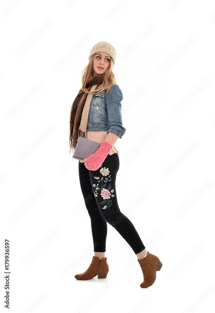 full length portrait of a cute girl wearing fall fashion, standing pose on white background. full length portrait of a cute girl wearing fall fashion, standing pose on white background.
