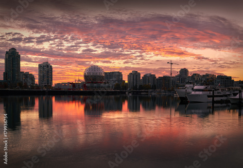False Creek Sunrise  Vancouver. Sunrise on the Vancouver skyline on the edge of False Creek including condominium towers and the geodesic dome of Science World. British Columbia  Canada.    