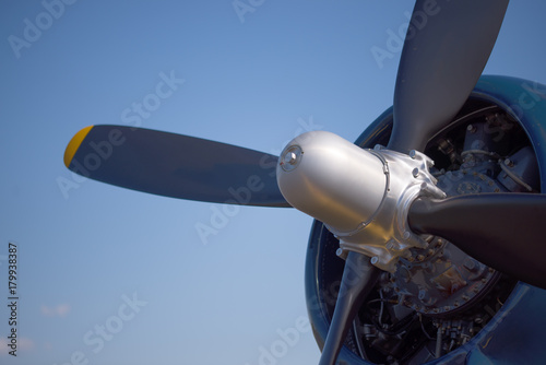 Close up of the engine and propeller of a vintage World War II fighter airplane