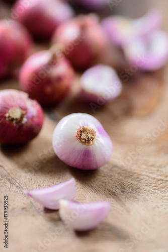 Slice shallots on wooden background for cooking,spice an herb,food ingredient