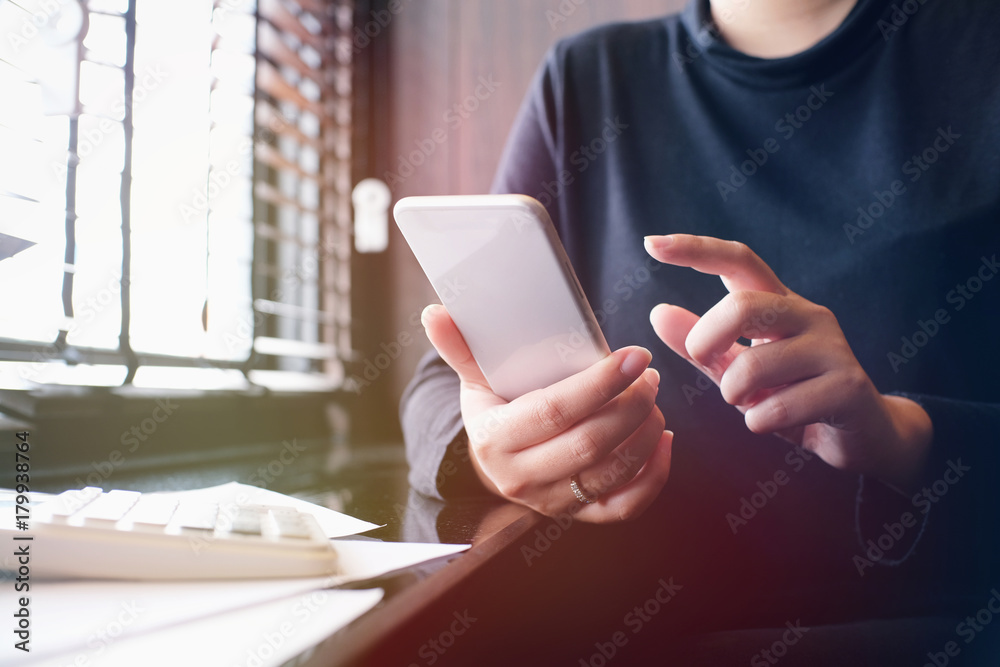 Business accounting women work with smart phone. Financial technology concept