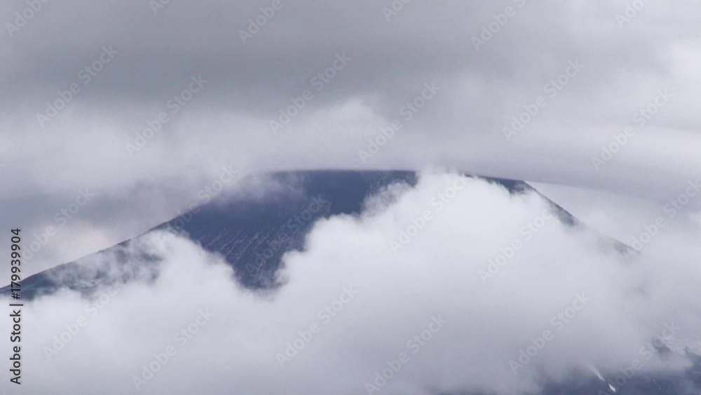 Villarrica Volcano, Pucon, Chile - April 04, 2017. Clouds over Villarrica Volcano in Pucon, Chile. Villarrica Volcano, Pucon, Chile - April 04, 2017. Clouds over Villarrica Volcano in Pucon, Chile.
