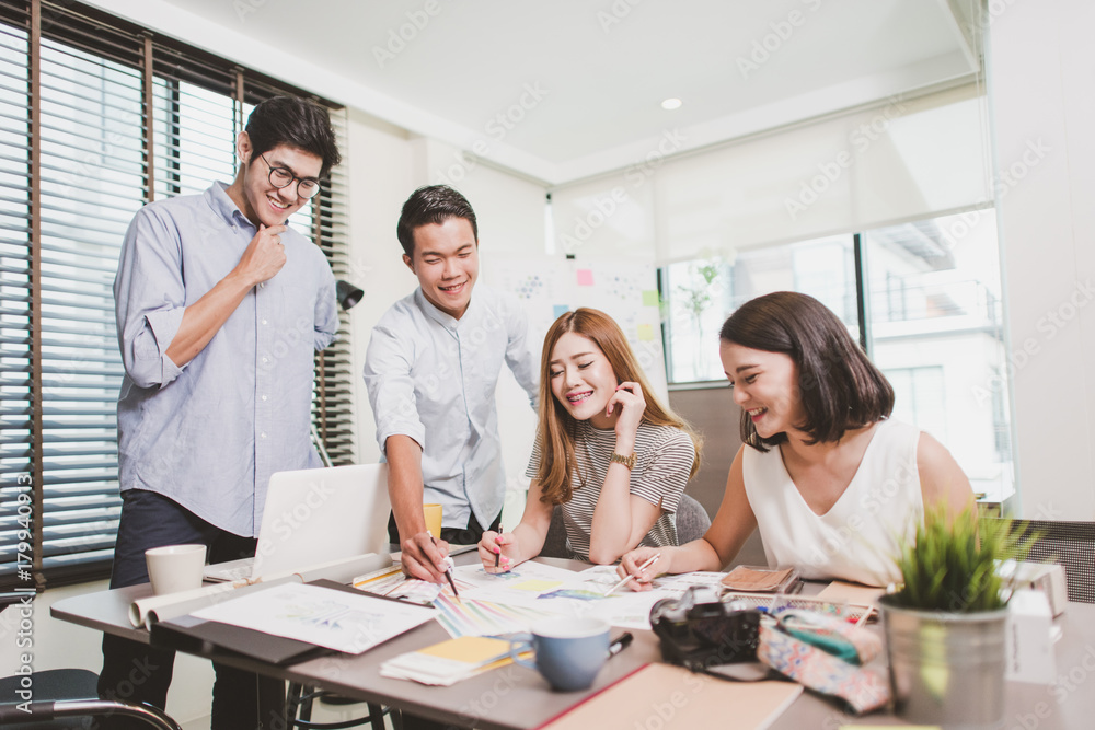 Group of Business People Working on an office Desk Group of Business People Working on an office Desk