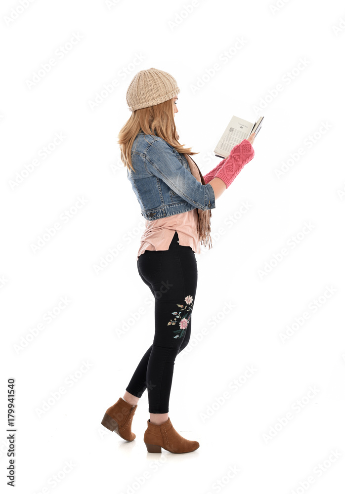 full length portrait of a cute girl wearing fall fashion, standing pose on white background. full length portrait of a cute girl wearing fall fashion, standing pose on white background.