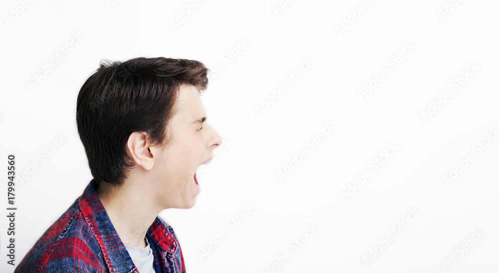 Side portrait of a shouting man rage scream emotional Side portrait of a shouting man rage scream emotional