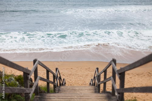Wooden staircase leading down to the iconic Bells Beach photo