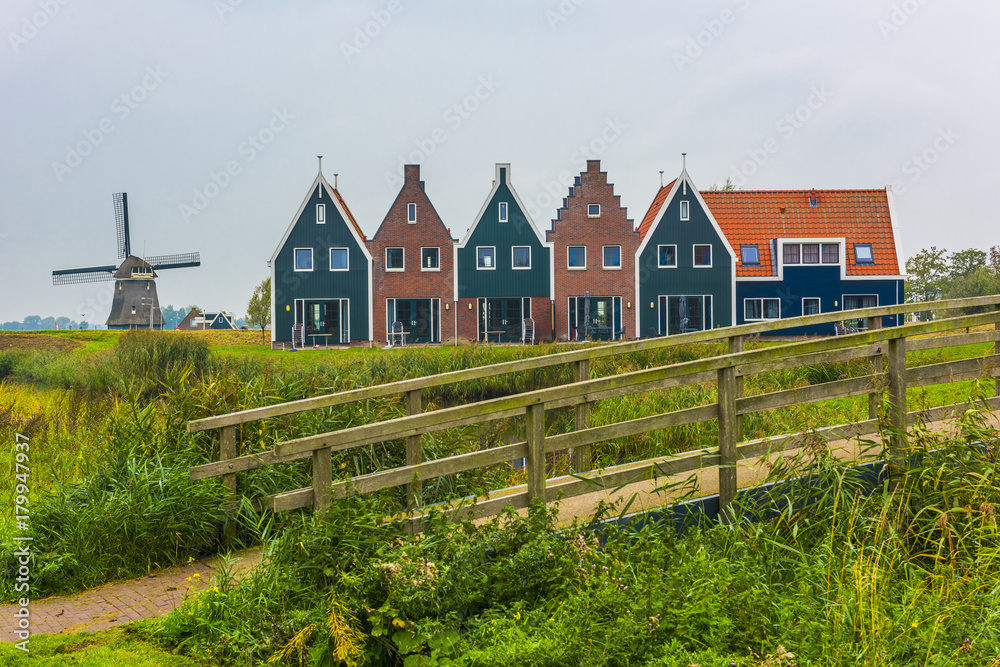 Volendam is a town in North Holland in the Netherlands. Colored houses of marine park in Volendam. North Holland, Netherlands. Volendam is a town in North Holland in the Netherlands. Colored houses of marine park in Volendam. North Holland, Netherlands.