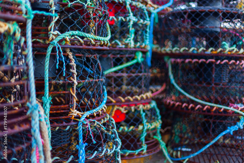 Fishing cray pots with coloured frayed rope Fishing cray pots with coloured frayed rope