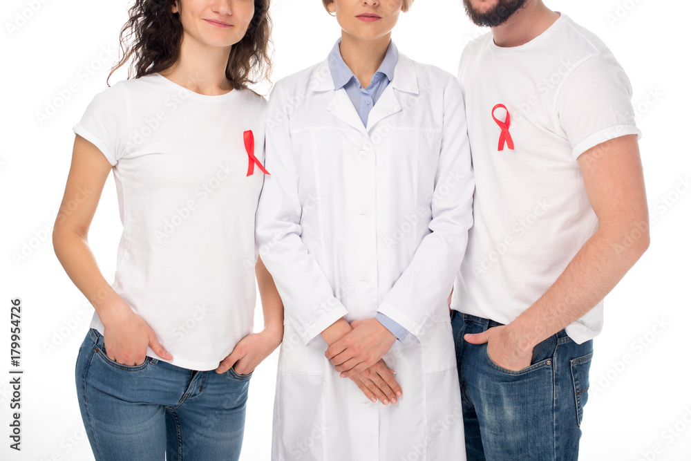 couple and doctor with aids ribbons