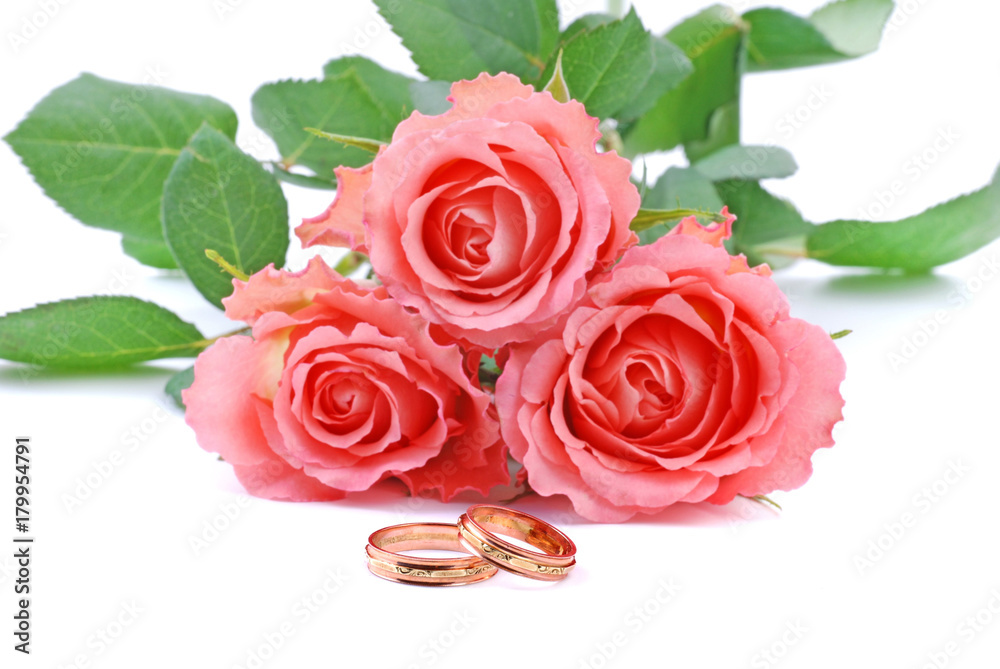 Wedding rings and roses. Wedding rings and roses.