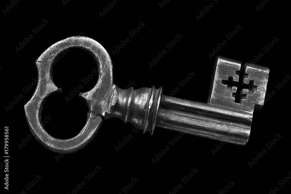 retro key on a black background. Rare object retro key on a black background. Rare object