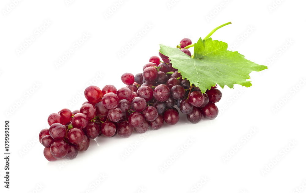 Red grape with leaf isolated on white background Red grape with leaf isolated on white background