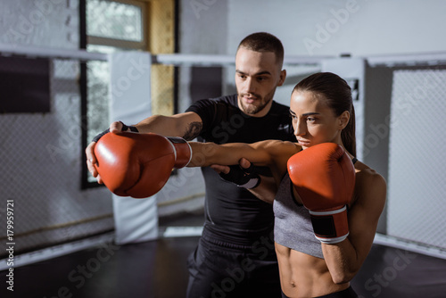 trainer and female boxer