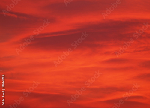 red sunset sky with clouds background photo