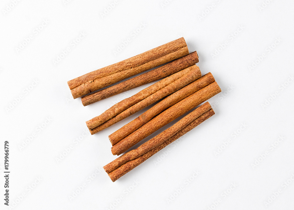 Cinnamon sticks on white background. Canella isolated. Cassia bark.