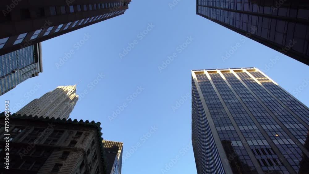 Looking up drone aerial shot of modern skyscrapers in NYC New York City Manhattan street Looking up drone aerial shot of modern skyscrapers in NYC New York City Manhattan street